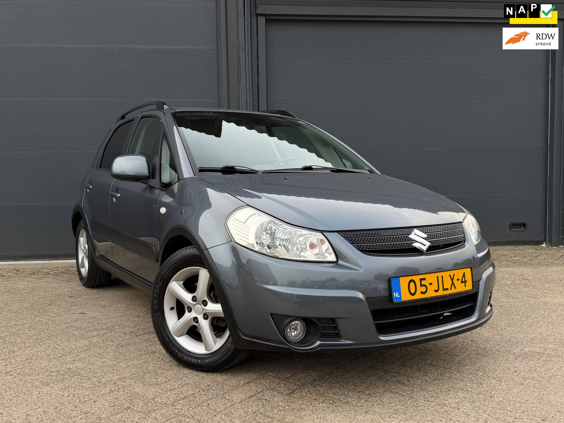 Suzuki Sx4 1.6 | 5 Deurs | Airco | Trekhaak | 1Ste Eigenaar | 2009 - voorkant