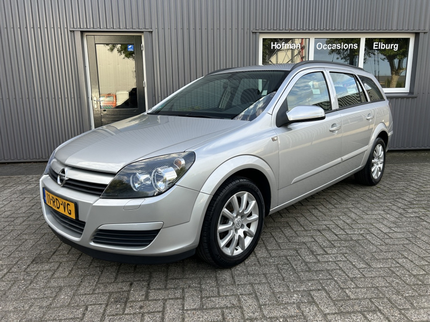 Opel Astra Station Wagon 1.6 Enjoy Airco Cruise APK! 2005 - voorkant