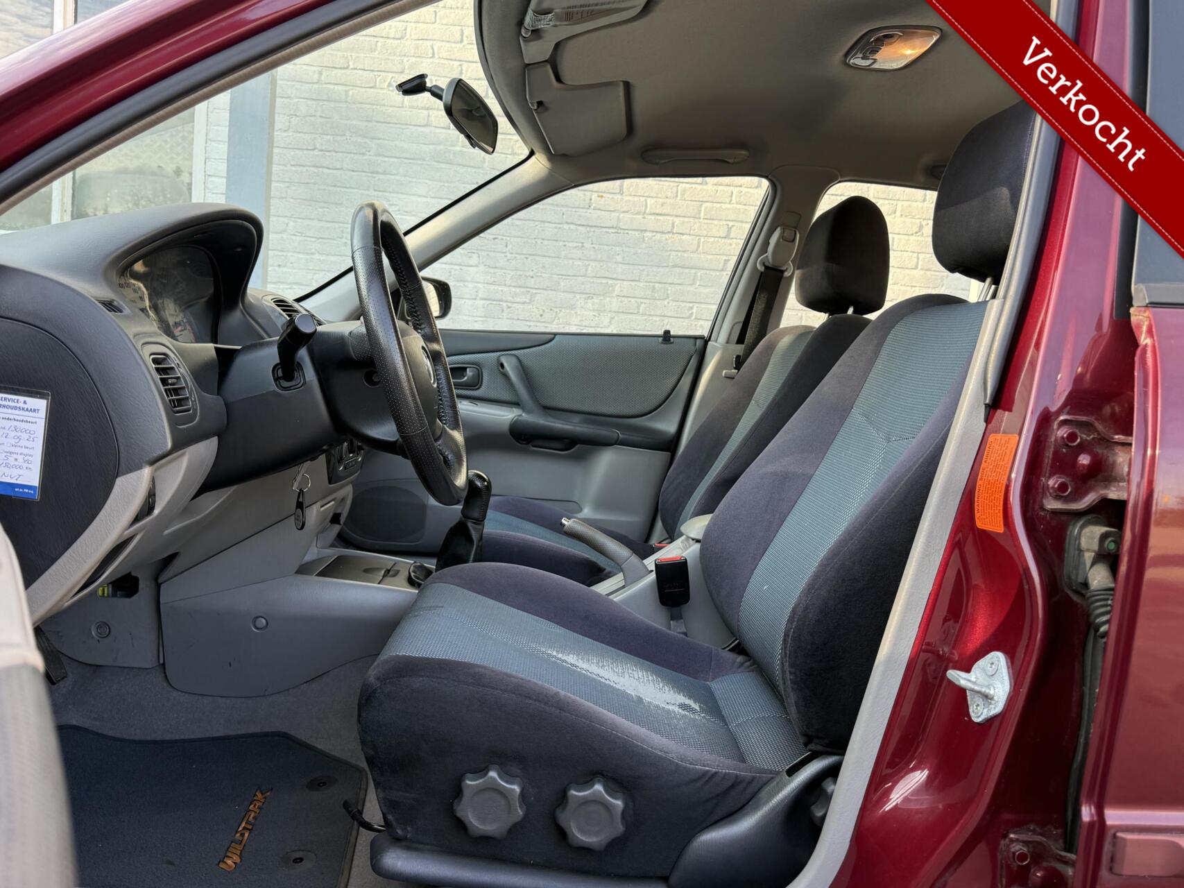 Foto van Mazda Mazda 323