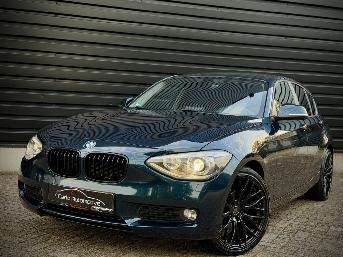BMW 116i 116i Executive AUT|CLIMA|XENON|NAVI|PDC 2014 - voorkant