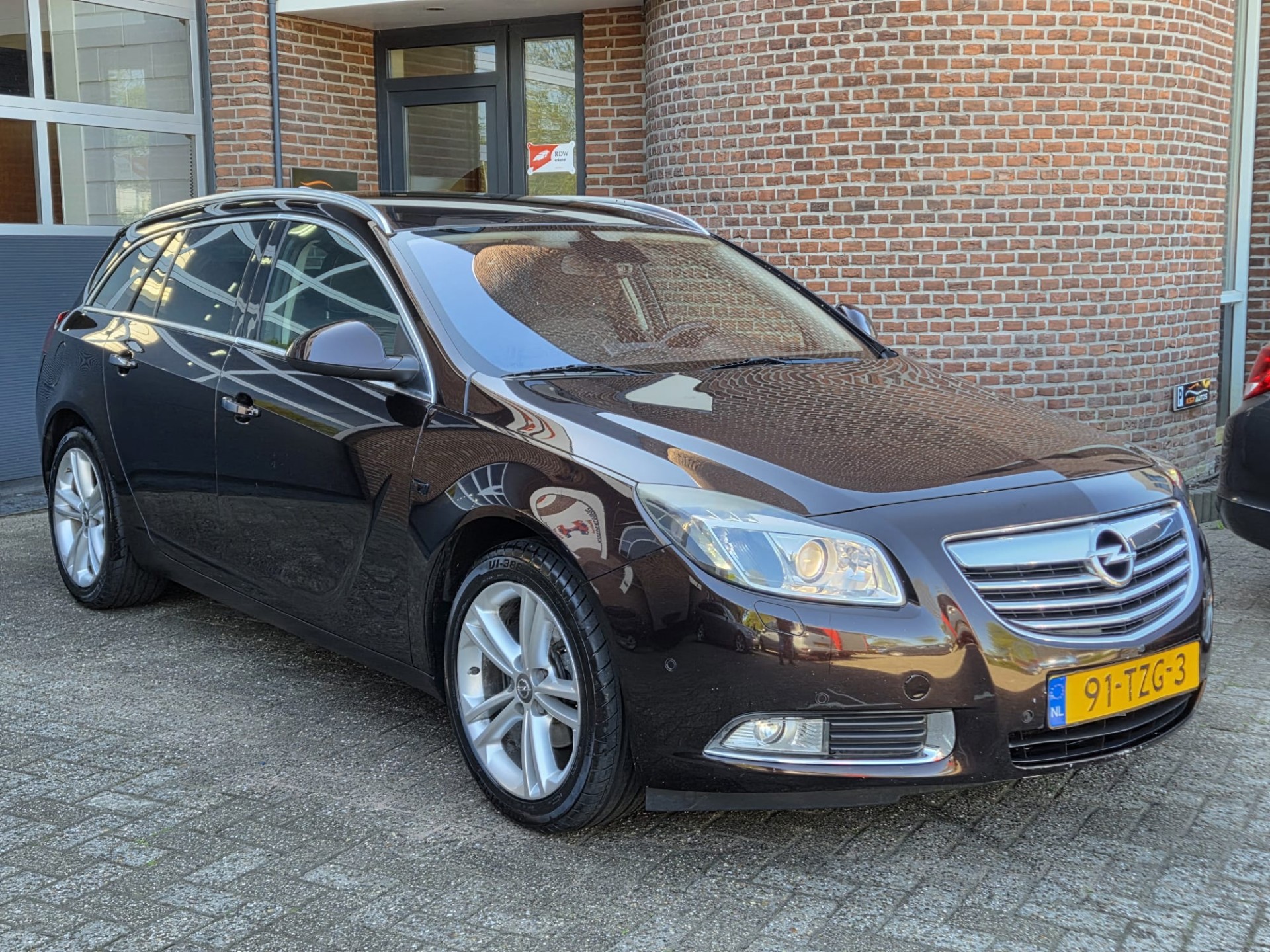 Opel Insignia Sports Tourer SW 1.4 Turbo EcoFLEX Cosmo | PDC | Cruise | Nap | Apk 2012 - voorkant