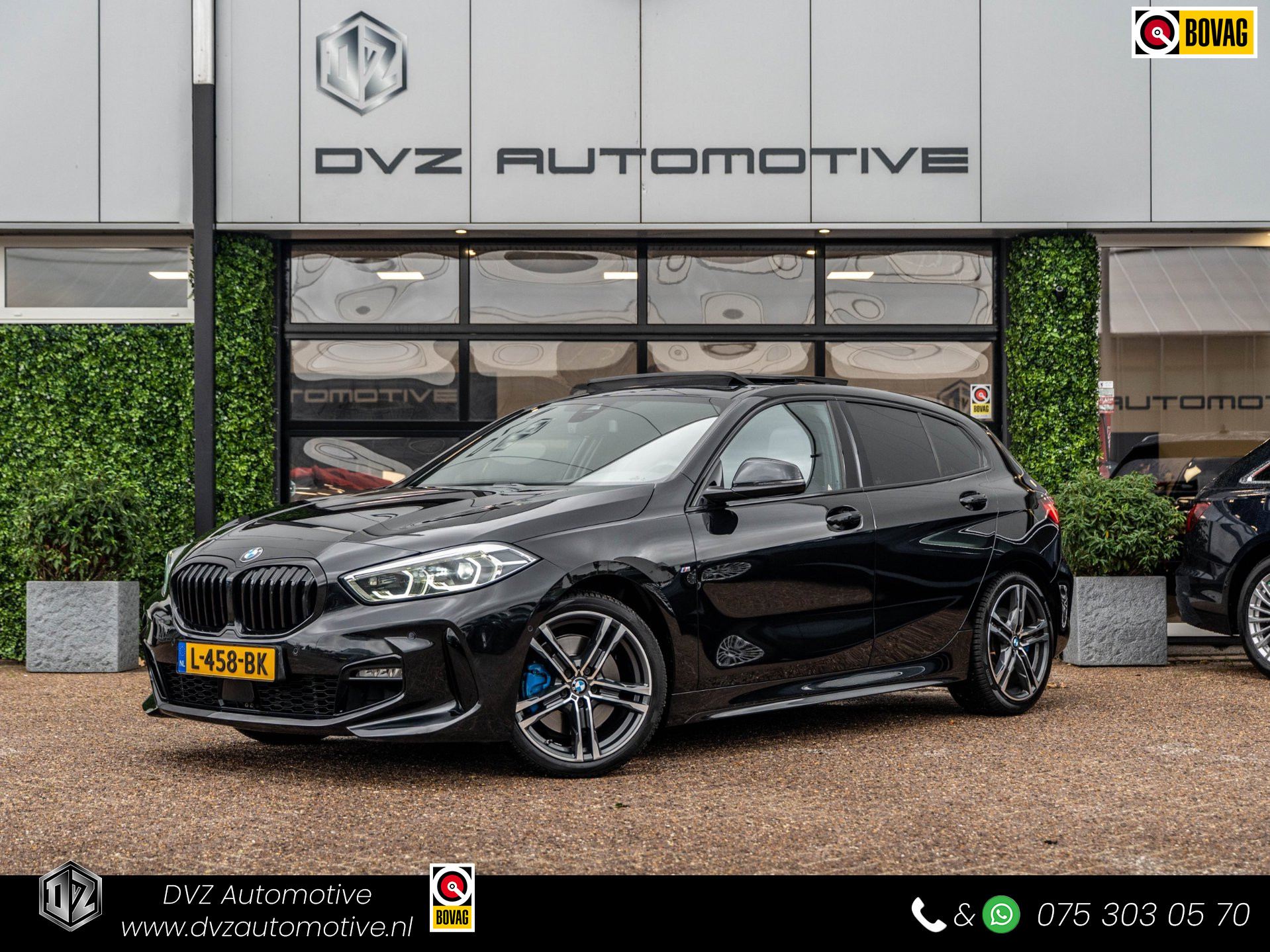 BMW 120i 120i High Executive | M-Sport Shadow | Pano | Leder | Ambiance 2021 - voorkant