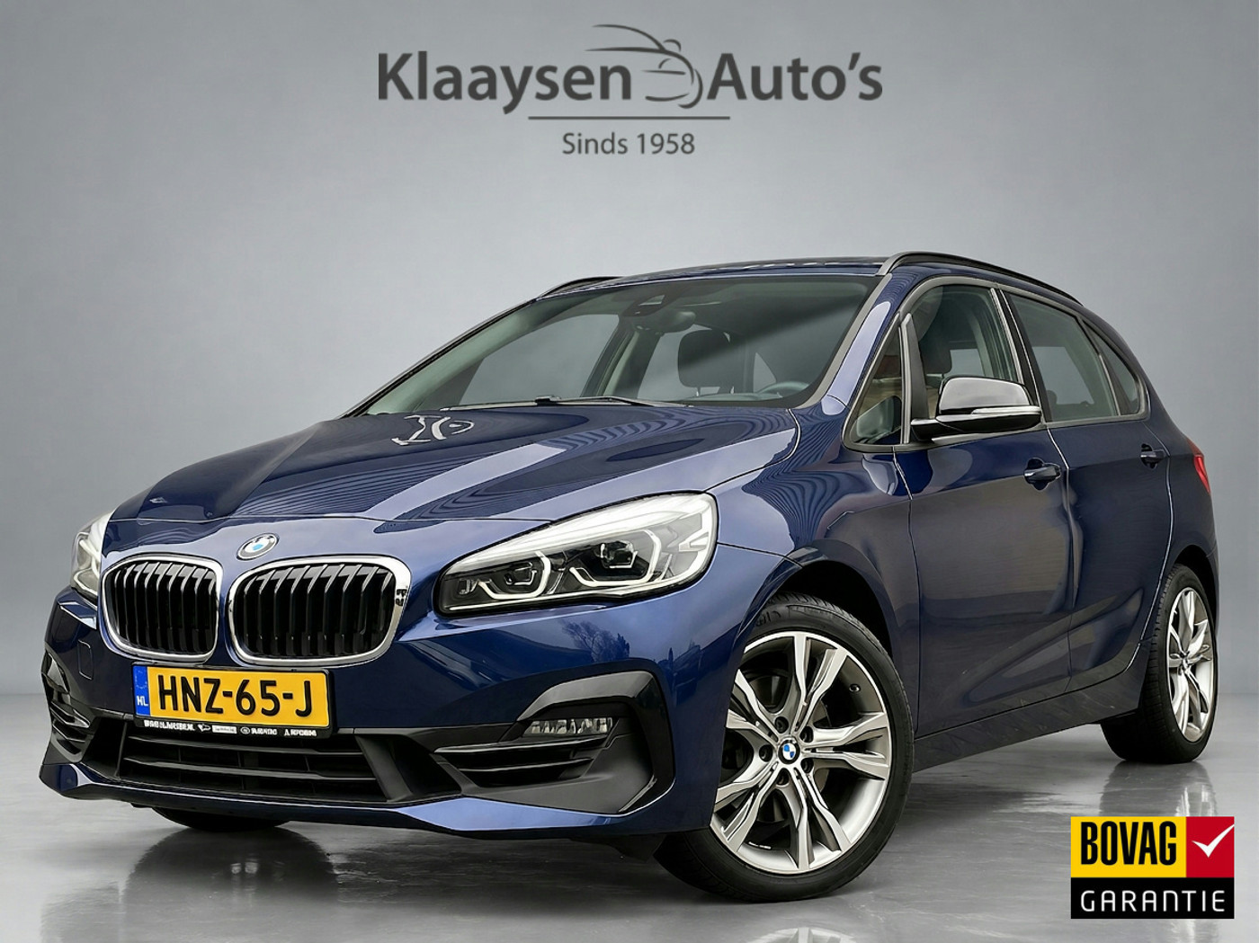 BMW 2-serie Active Tourer 220i High Executive Edition 192 pk M-sport AUT. | dealer onderhouden | navigatie | trekhaak | panoramadak 2020 - voorkant