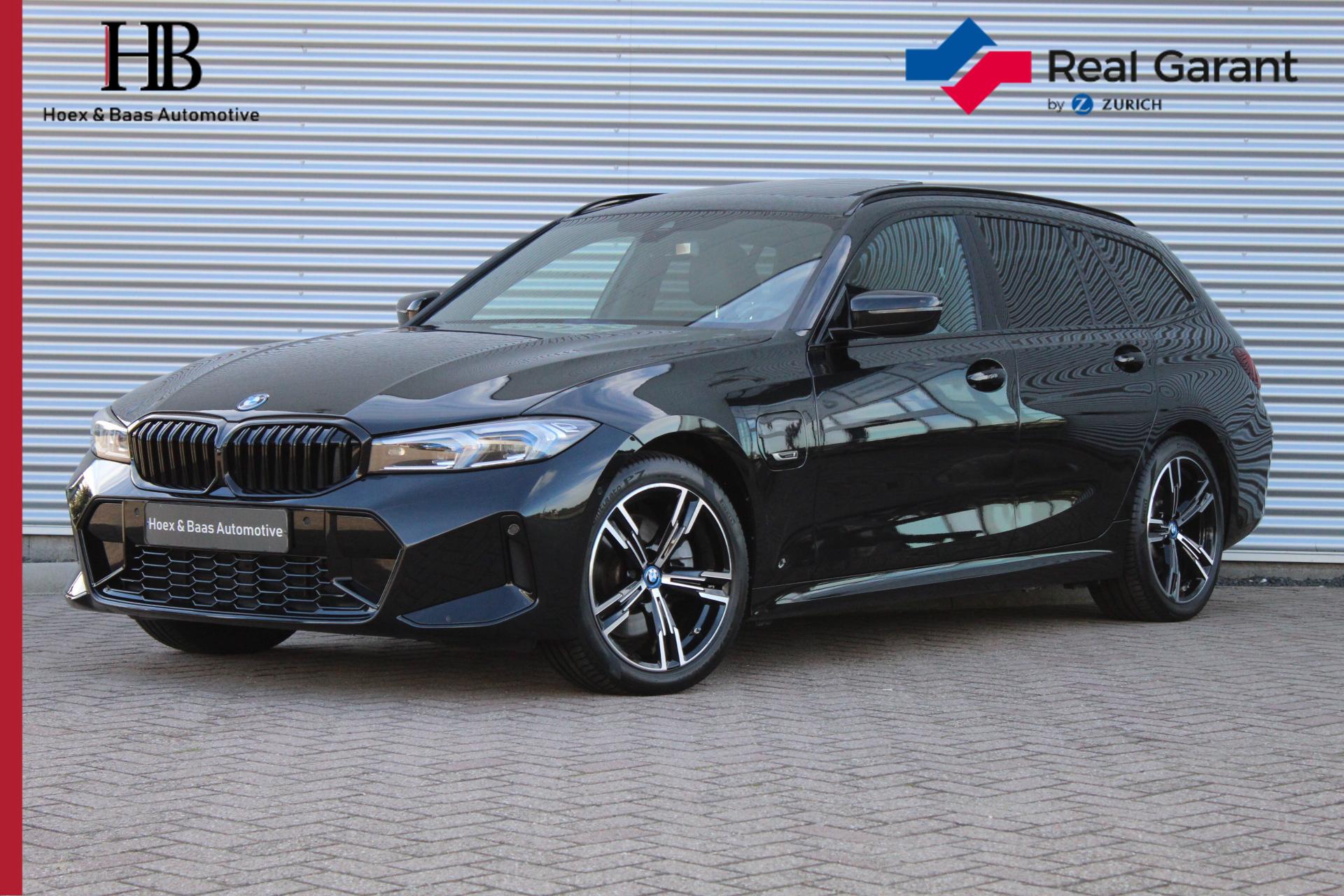 BMW 3-serie Touring 320e M-pakket/Pano/Trekhaak/Headup/SOH 90.5% 2023 - voorkant