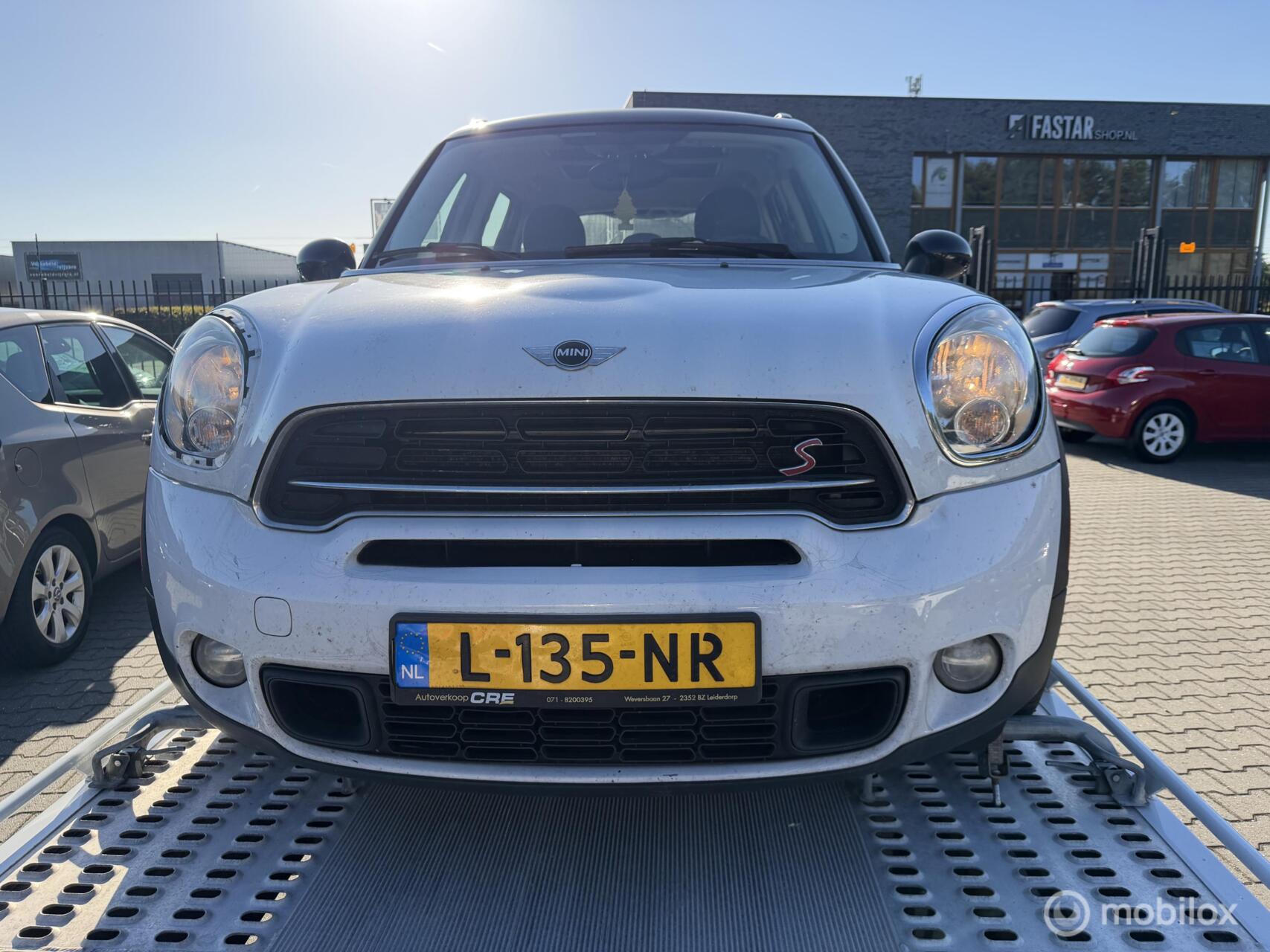Mini Cooper Countryman 1.6 Cooper S Champ Edition lees tekst 2014 - voorkant