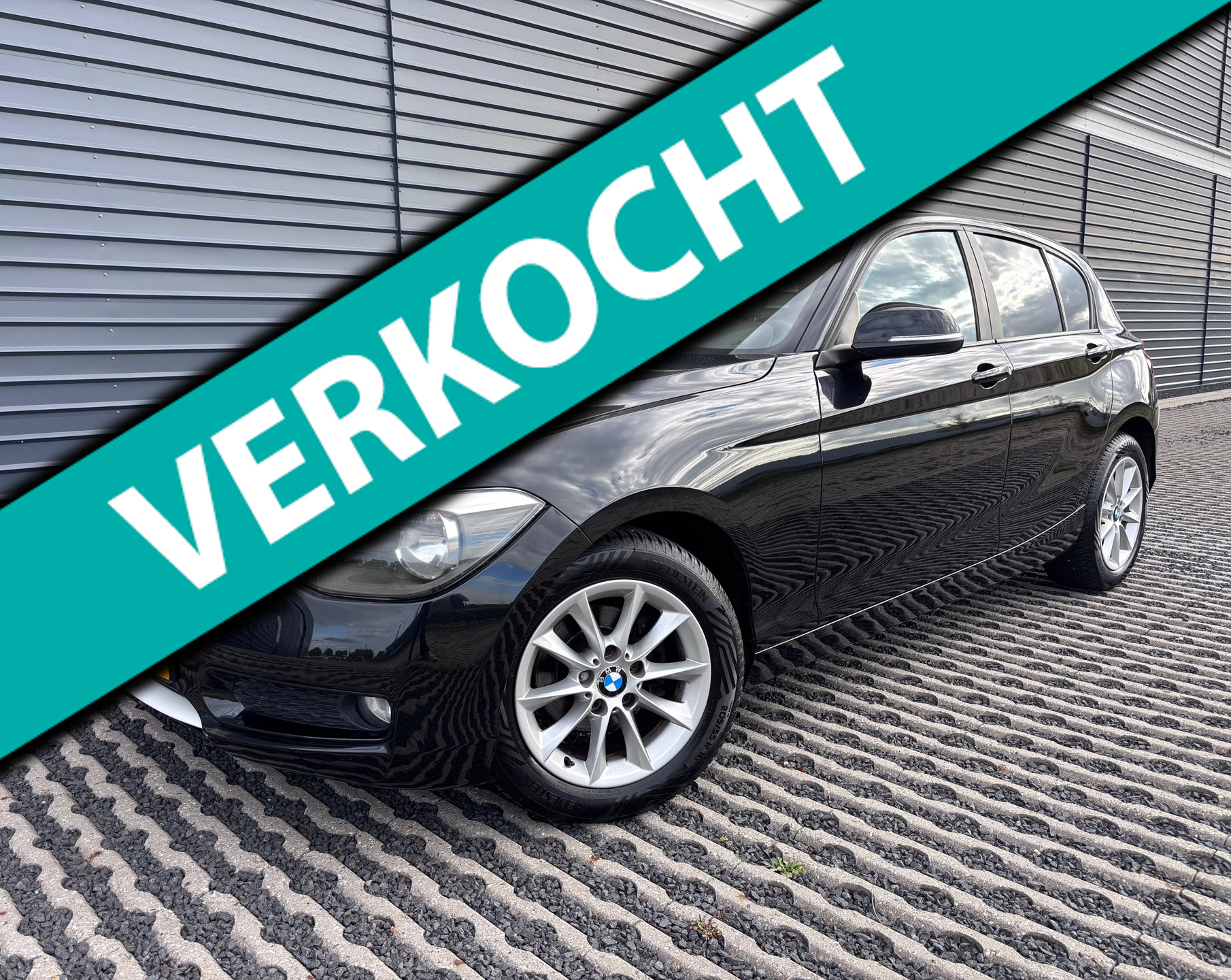 BMW 114i 114i EDE High Executive | Navigatie | Half-leder 2013 - voorkant