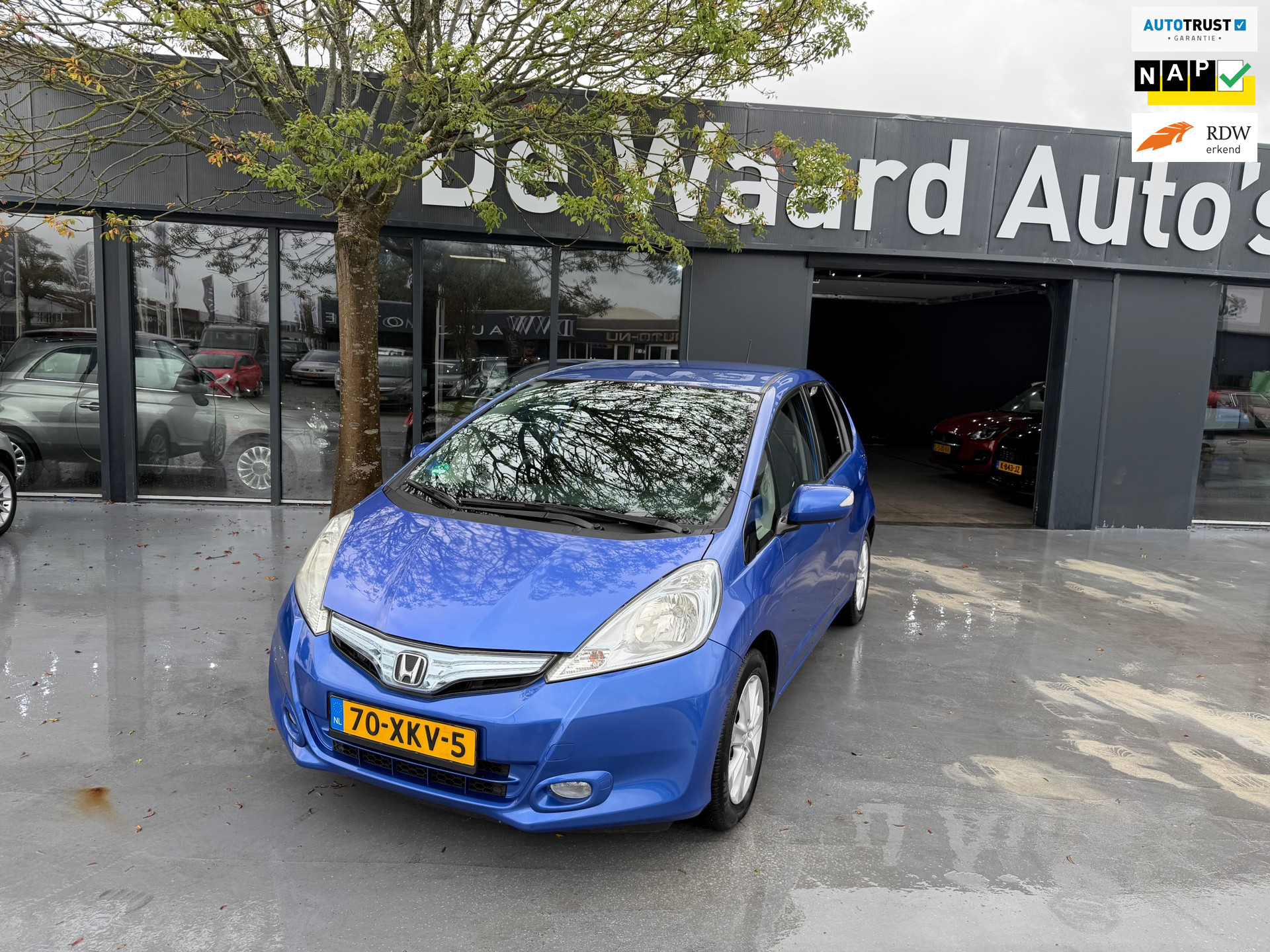 Honda Jazz Hybrid 1.4 Hybrid Business Mode +/ automaat/Hybride/airco/cruise/NAP/ LM velgen/Navi/12 maanden garantie 2012 - voorkant