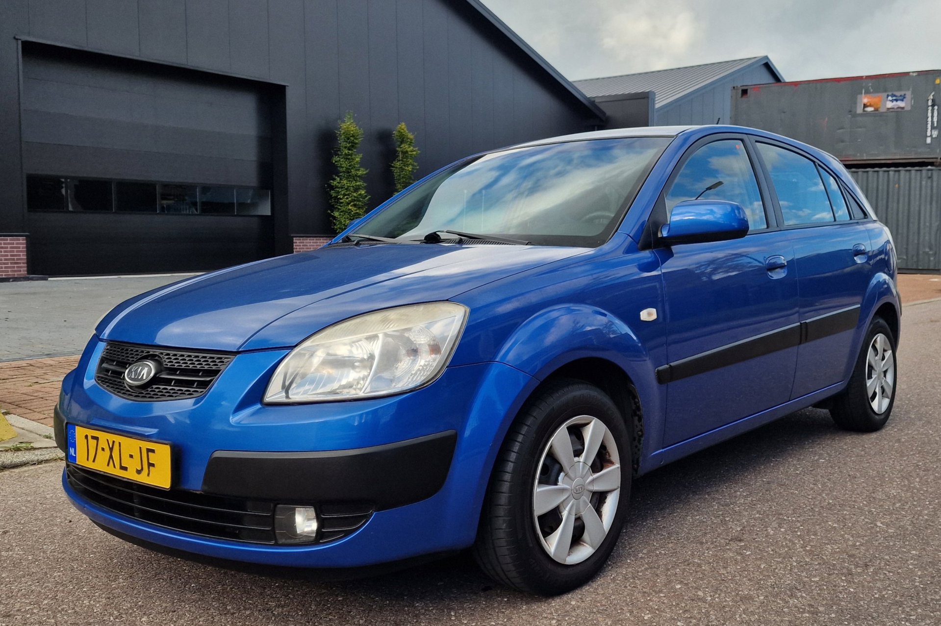 Kia Rio 1.4 X-tra NAVIGATIE AIRCO TREKHAAK 2 X SLEUTELS 2007 - voorkant
