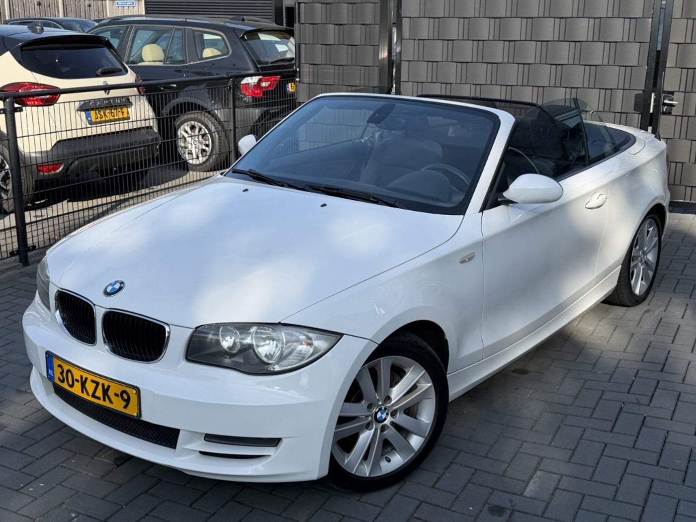 BMW 1er Reihe 118i Executive 2010 - voorkant