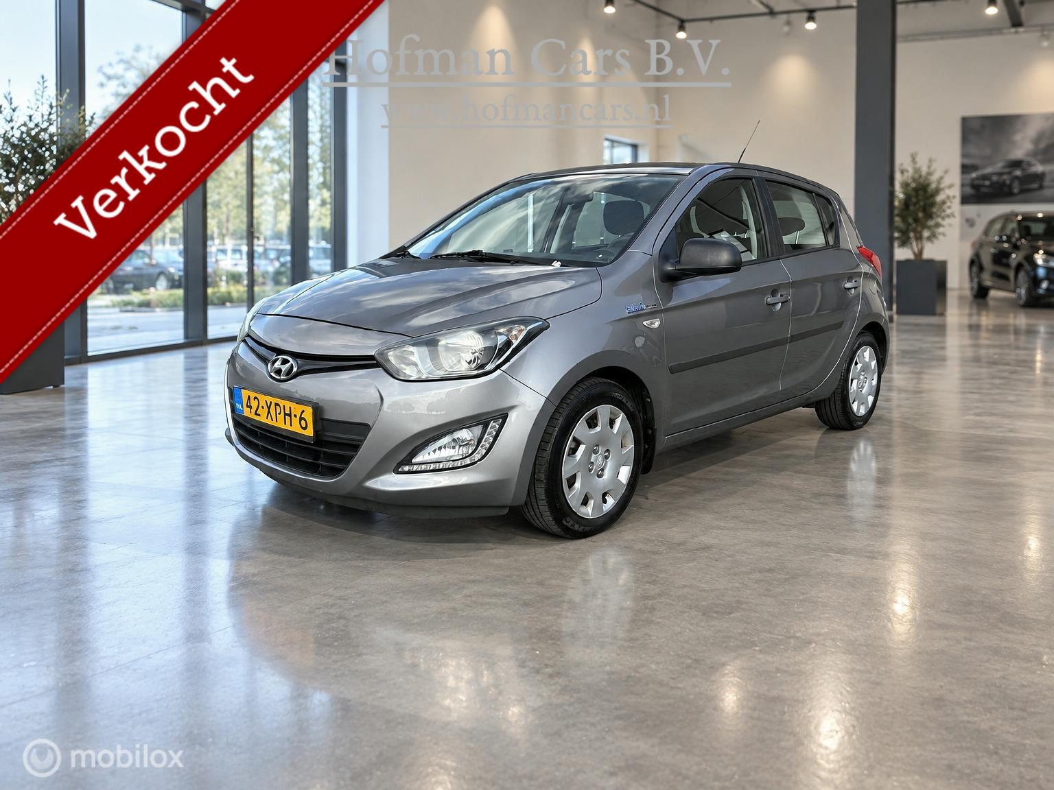 Hyundai I20 1.2i Business Edition | Airco | 142.819 km | Grijs Metallic 2012 - voorkant