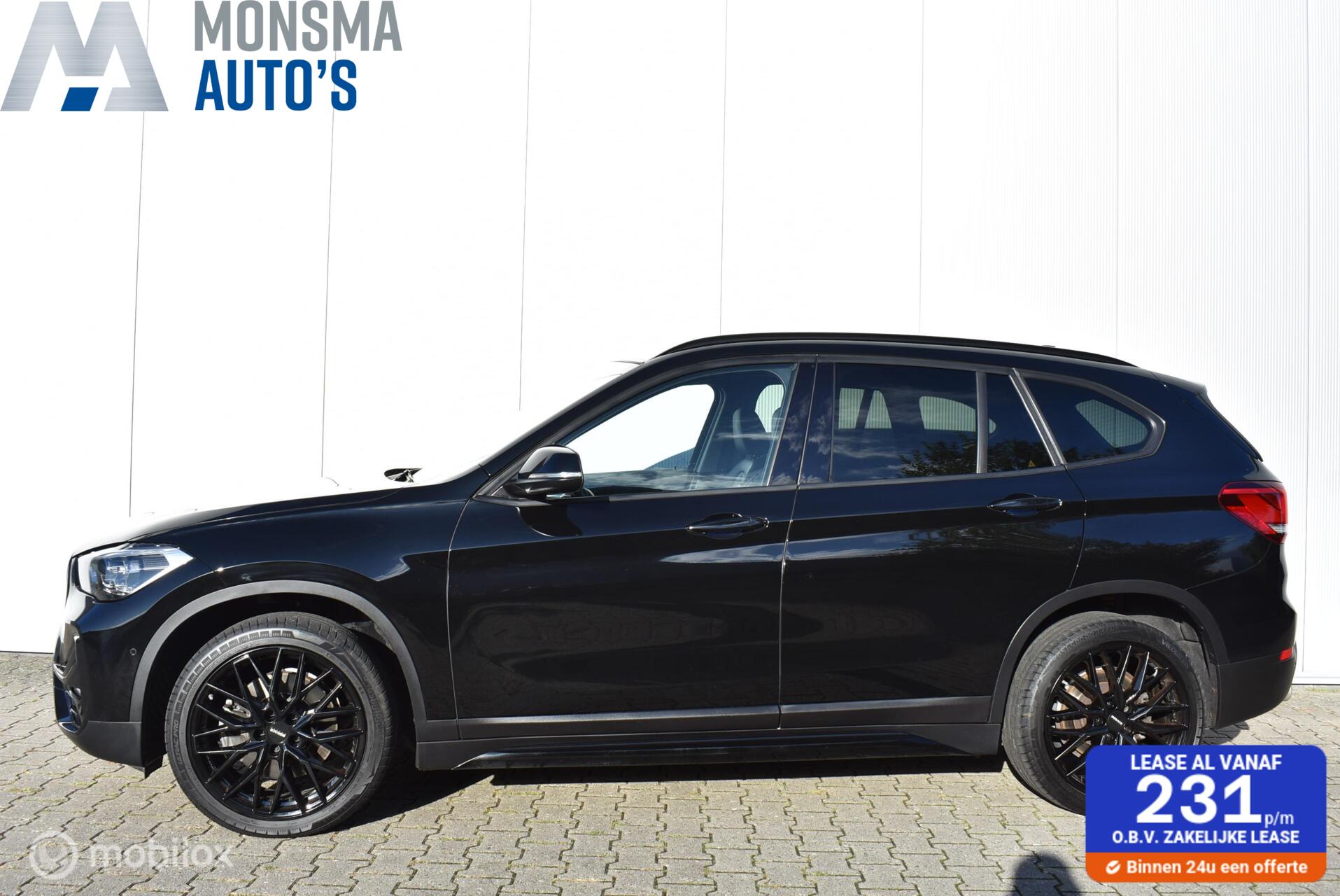 BMW X1 Sdrive20i sDrive20i Schwarz ll Leder Sportstoel H/K HUD LED DAB Camera 19" LMV 2019 - voorkant