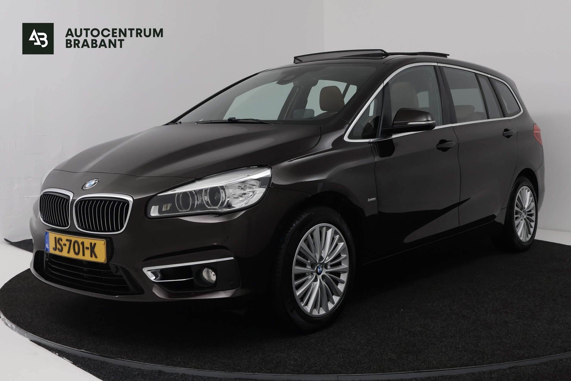 BMW 218i Gran Tourer 218i Centennial High Executive 7p (TREKHAAK, STOELVERWARMING, ELEKTR STOELEN, HUD-DISPLAY) 2016 - voorkant