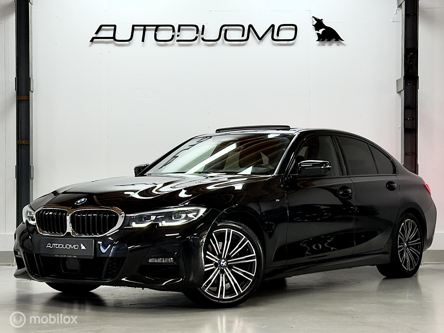 BMW 320i 320i High Executive M Sport | Pano | ACC | Dodehoek | Leer | Sfeer | Stoelverwarming | Driving Assistant Professional | 184PK 2021 - voorkant