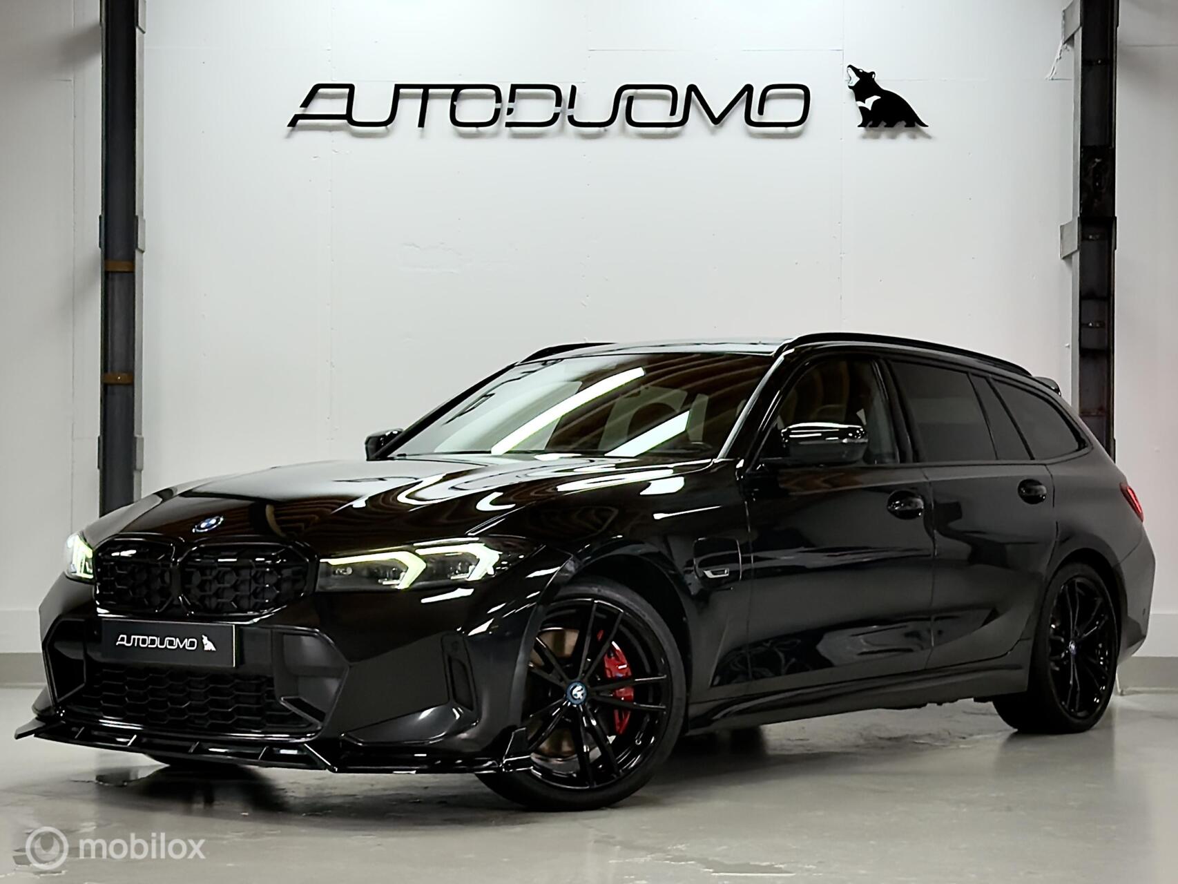 BMW 3-serie Touring 330e Hybrid | Panorama | Keyless | Leer | BOOMVOL 2023 - voorkant