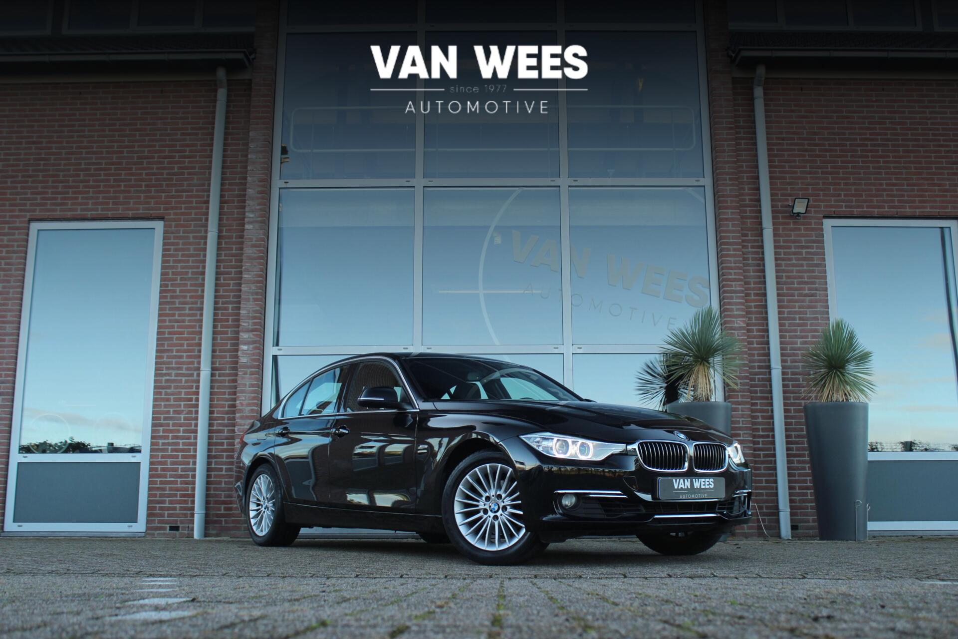 BMW 320i 320i High Executive | 2e eigenaar | Origineel NL | Luxury Line | Navigatie Professional | HiFi audio | Cruise control | Xenon | Sportstuur | Stoelverwarming | Bluetooth | PDC 2014 - voorkant