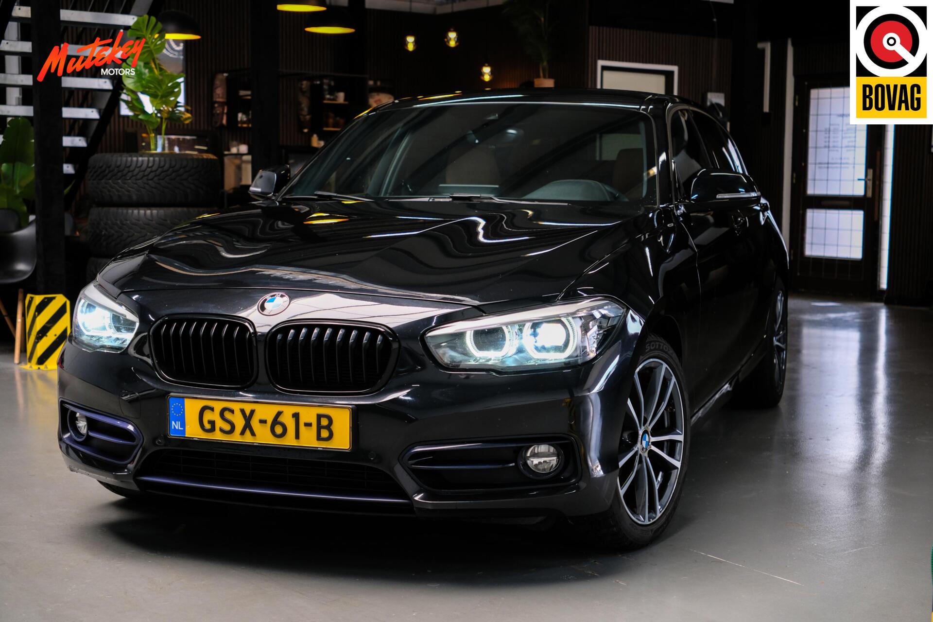 BMW 1-serie 118i Edition Sport Line Shadow | Cognac 2019 - voorkant