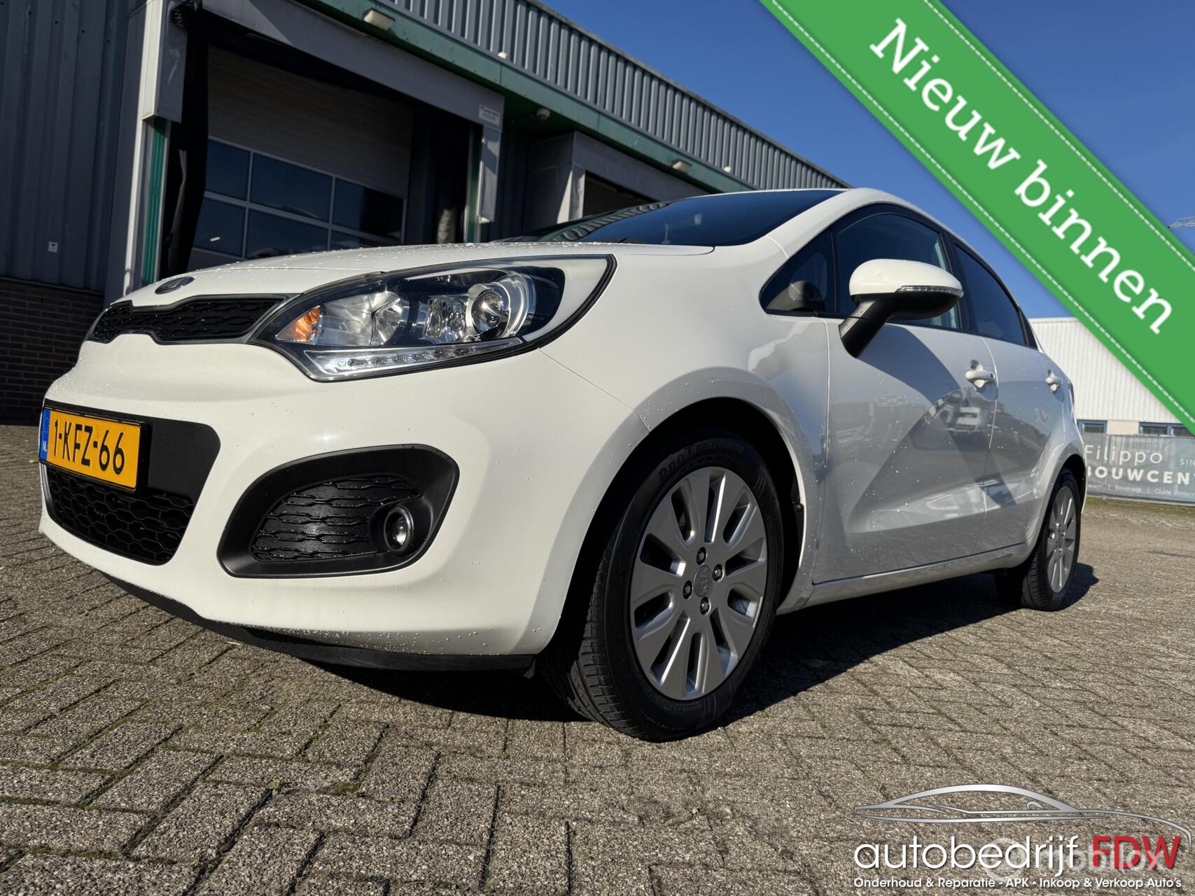 Kia Rio 1.2 CVVT/5DEURS/LED/XENON/AIRCO/PARK SENSOR/NAP/ 2013 - voorkant