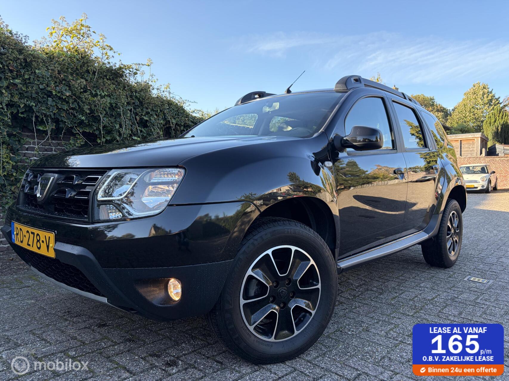 Dacia Duster 1.2 TCe 4x2 Blackshadow / Leder / Navigatie 2017 - voorkant
