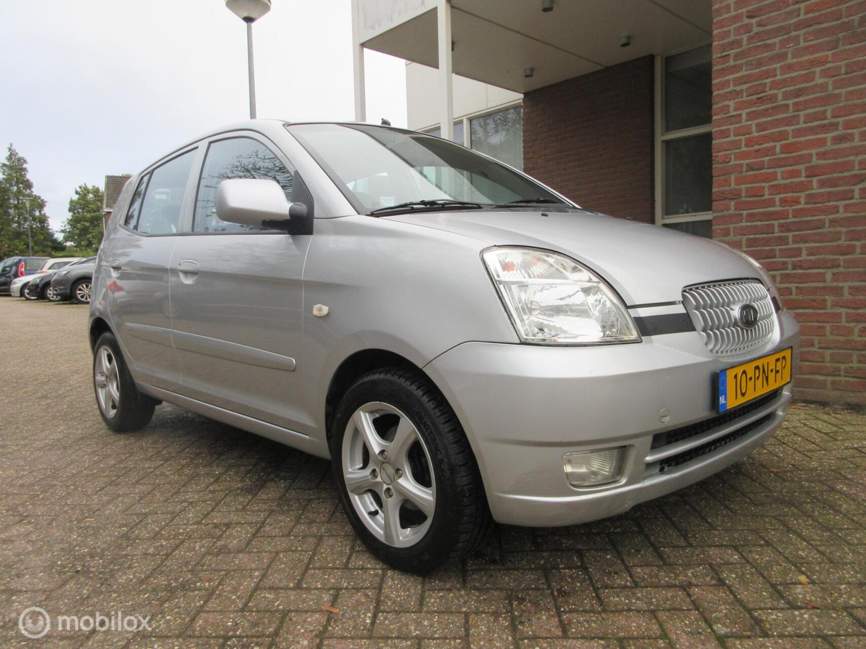 Kia Picanto 1.1 EX Automaat / 149471KM NAP / Airco / 5drs / 4 Seizoenenbanden 2004 - voorkant