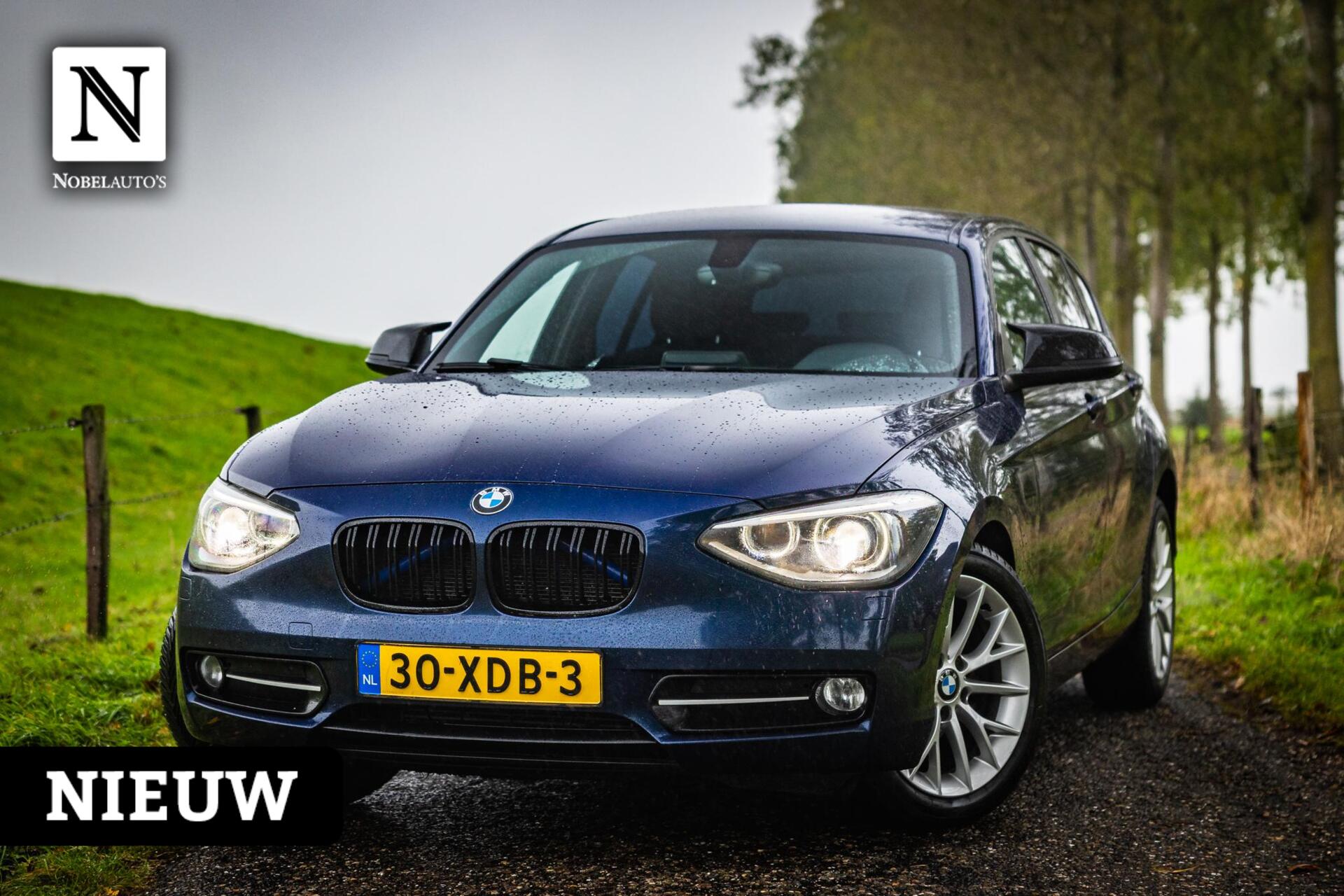 BMW 1er Reihe 116i Business+|Apple CarPlay|clima|Cruis|New APK 2012 - voorkant