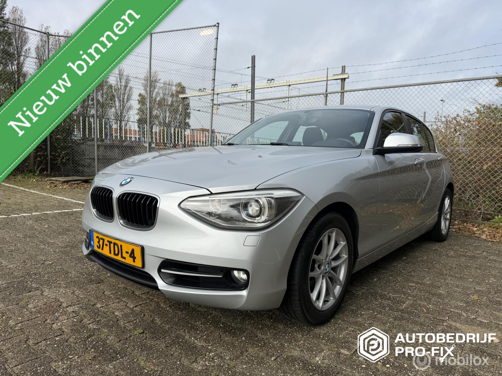 BMW 1er Reihe 118i Business+  210PK 2012 - voorkant