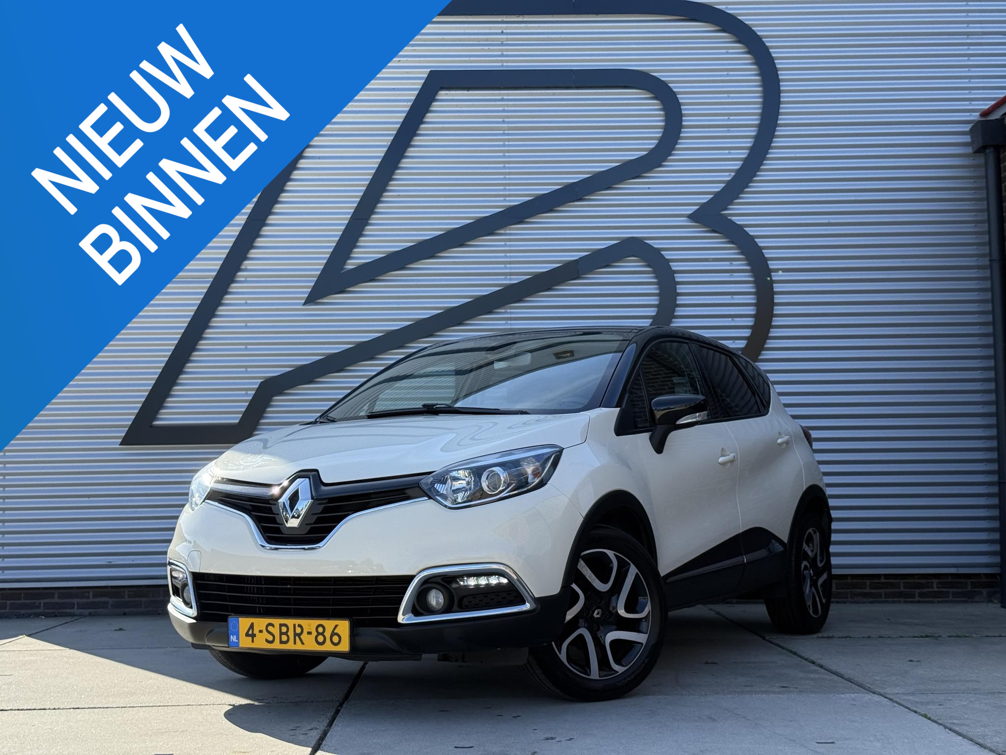 Renault Captur 0.9 TCe Dynamique 2013 - voorkant
