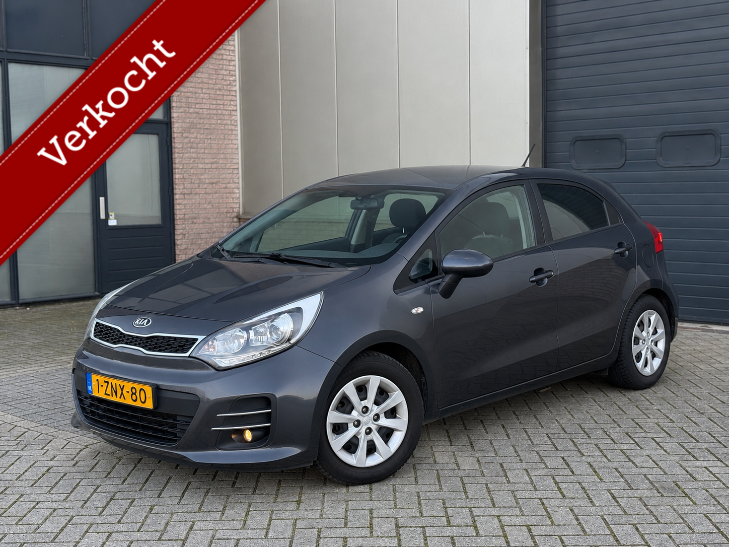 Kia Rio 1.2 CVVT DynamicLine 2015 Airco/Cruise/Camera/Navi 2015 - voorkant
