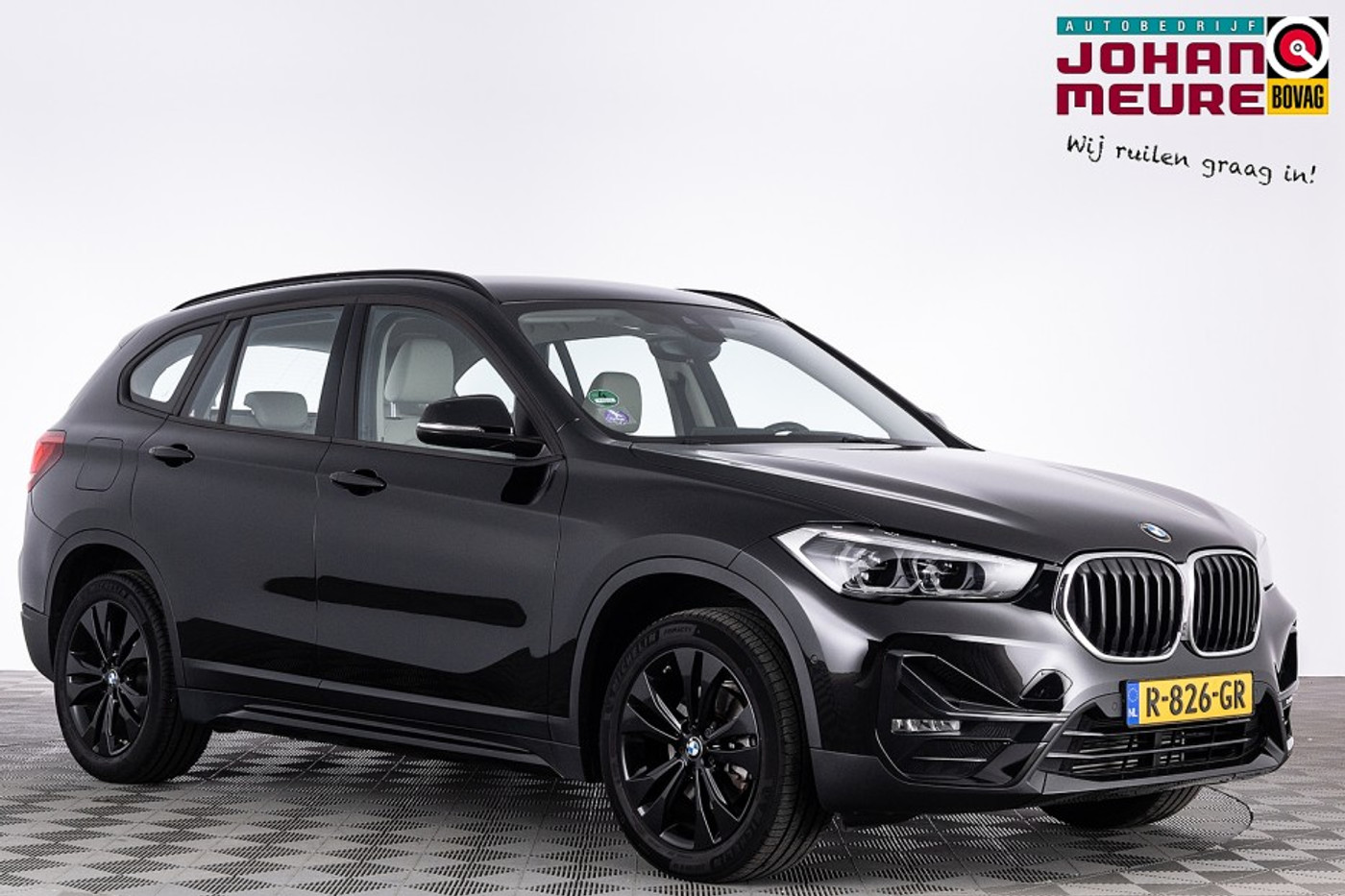 BMW X1 Sdrive18i sDrive18i Business Edition | LEDER ✅ 1e Eigenaar 2022 - voorkant