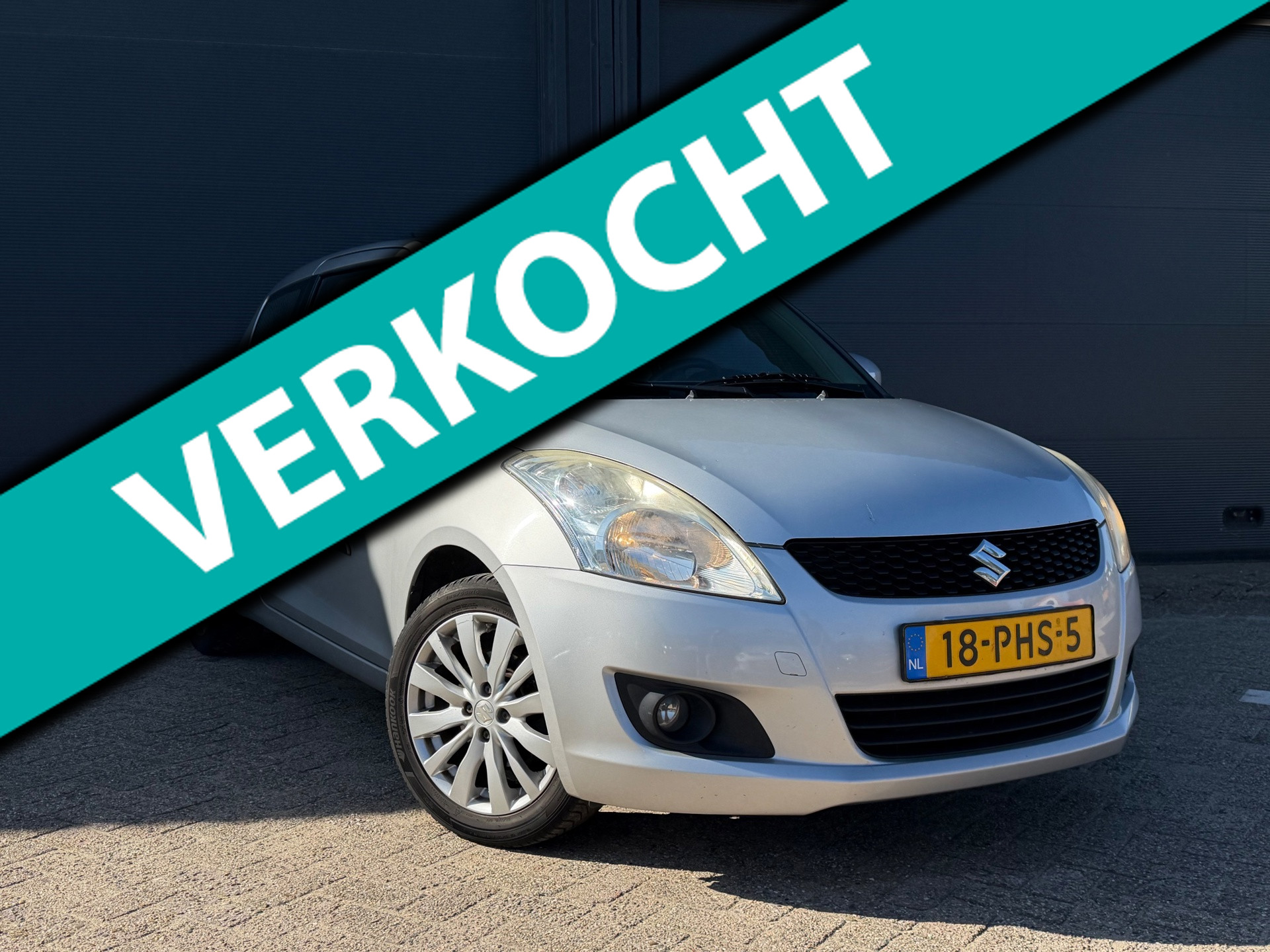 Suzuki Swift 1.2 Exclusive | Keyless | Airco | Stoelverwarming | 2011 - voorkant