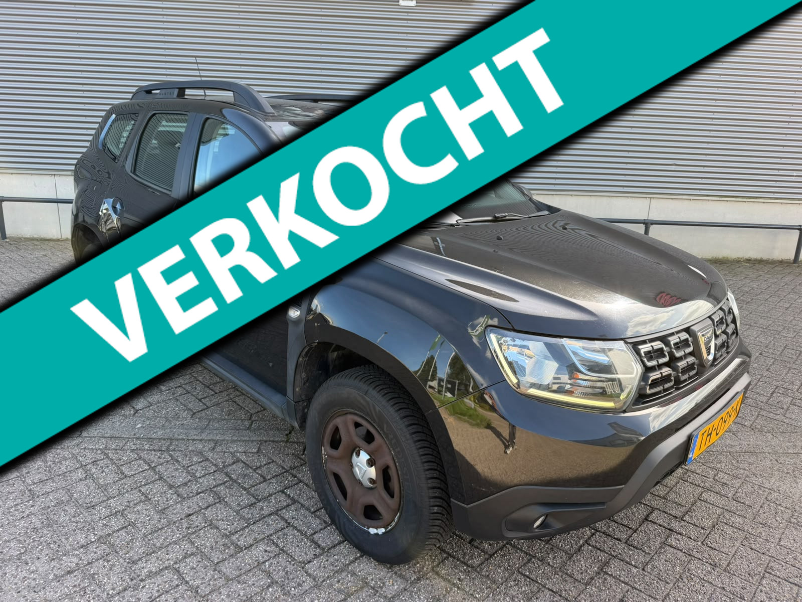 Dacia Duster **Dacia Duster 1.2 TCe Comfort | 2018 | Nieuwe APK | Ruime SUV | Zwart | Benzine | Handgeschakeld** 2018 - voorkant